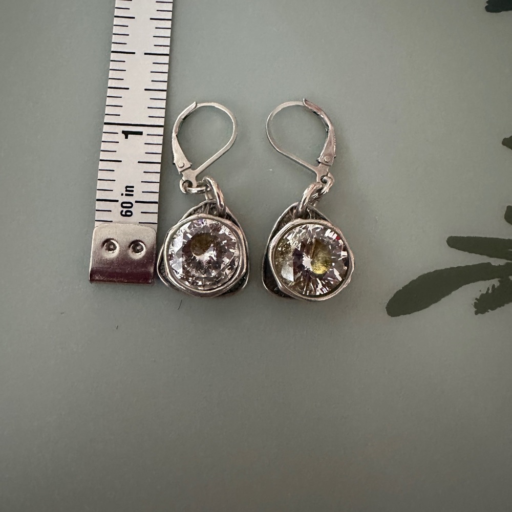 Karyn Chopik drop earrings.